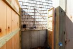 Rebuilt fully enclosed outdoor shower in the private backyard 
